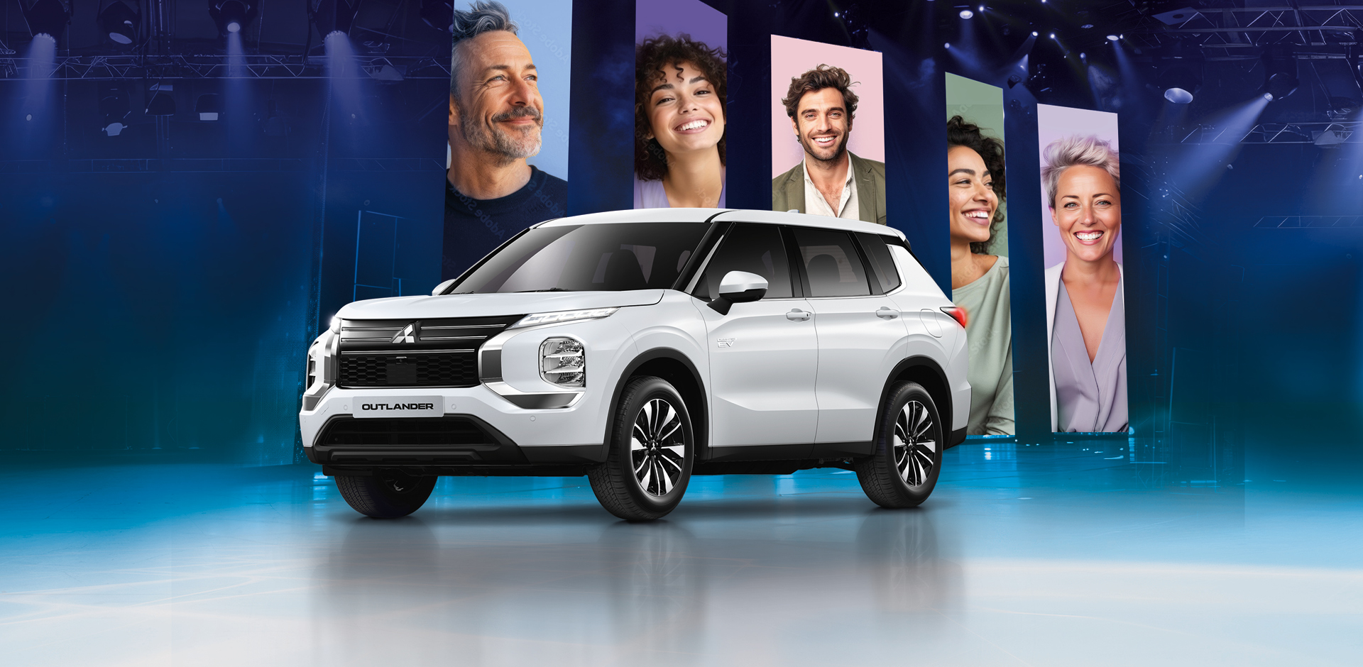 Eine Bühne mit dem Outlander BASIS und Bannern im Hintergrund auf denen lachende Menschen zu sehen sind